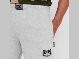 Everlast hrubé pánske tepláky v šedej farbe s elastickými manžetami naspodu, materiál 55% bavlna 45% polyester vyšívané logo